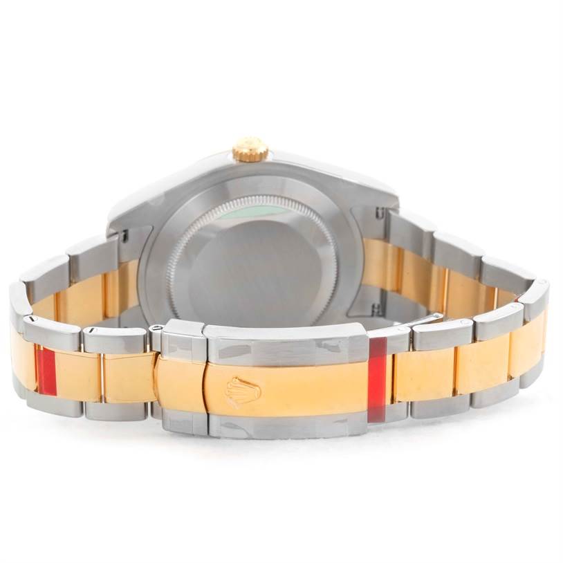 This image shows the back view of a Rolex Datejust 41 116333 Men's Steel and Gold (two tone) Black Dial 116333 Men's Steel and Gold (two tone) Black Dial with its steel and gold bracelet prominently displayed.