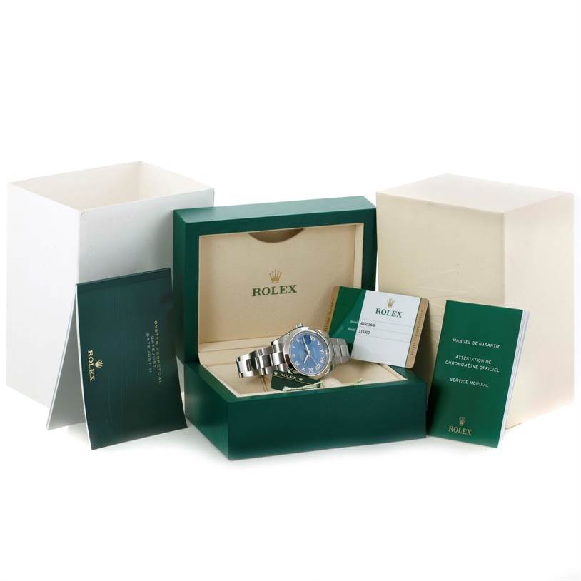 The Rolex Datejust 41 116300 Men's Stainless Steel Blue Dial 116300 Men's Stainless Steel Blue Dial watch is shown with its box, manual, and warranty card from a front view angle.