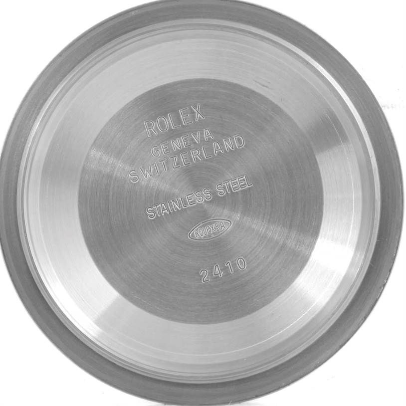 This image shows the inside of the stainless steel case back of a Rolex Datejust 41 116300 Men's Stainless Steel Black Dial 116300 Men's Stainless Steel Black Dial, with engravings indicating its origin.