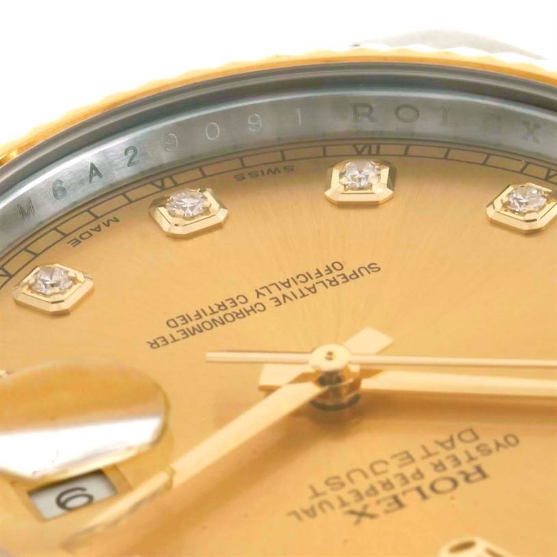 Close-up image of a Rolex Datejust 41 116333 Men's Steel and Gold (two tone) Champagne Dial 116333 Men's Steel and Gold (two tone) Champagne Dial watch showing the dial, diamond markers, hands, and partial date window.