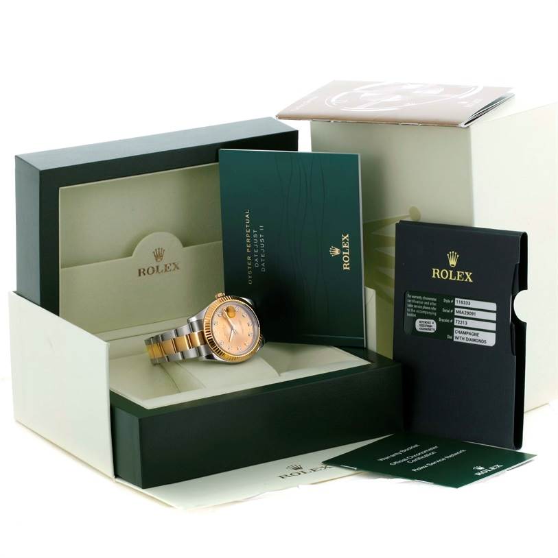 The watch is a Rolex Datejust 41 116333 Men's Steel and Gold (two tone) Champagne Dial 116333 Men's Steel and Gold (two tone) Champagne Dial, shown at an angle with its packaging, booklets, and warranty card.
