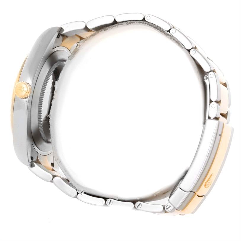 The Rolex Datejust 41 116333 Men's Steel and Gold (two tone) Champagne Dial 116333 Men's Steel and Gold (two tone) Champagne Dial watch is shown from a side angle, highlighting its bracelet and clasp.