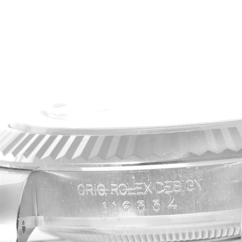 The image shows a close-up side view of the case and fluted bezel of a Rolex Datejust 41 116334 Men's Stainless Steel Blue Dial 116334 Men's Stainless Steel Blue Dial model.