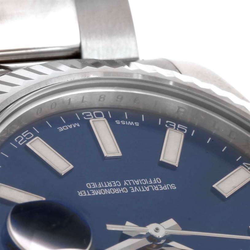 The image shows a close-up view of the dial, bezel, and part of the bracelet of a Rolex Datejust 41 116334 Men's Stainless Steel Blue Dial 116334 Men's Stainless Steel Blue Dial watch.