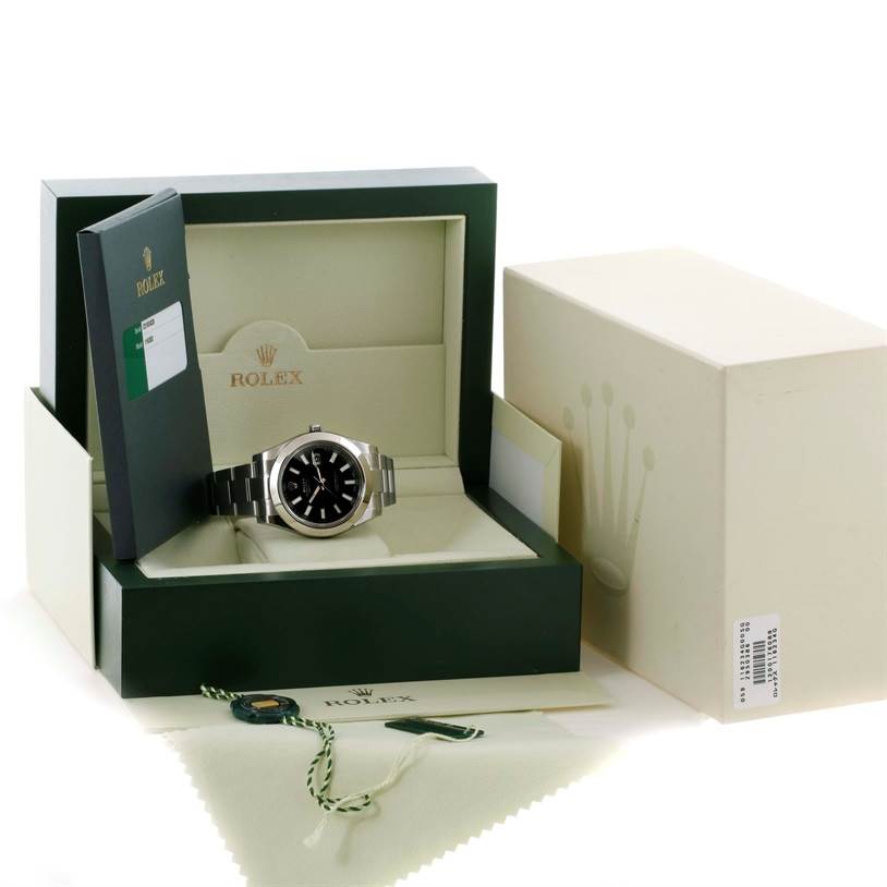 The Rolex Datejust 41 116300 Stainless Steel Black Dial 116300 Stainless Steel Black Dial watch is displayed inside its open box, with the warranty card, tags, and outer box visible.