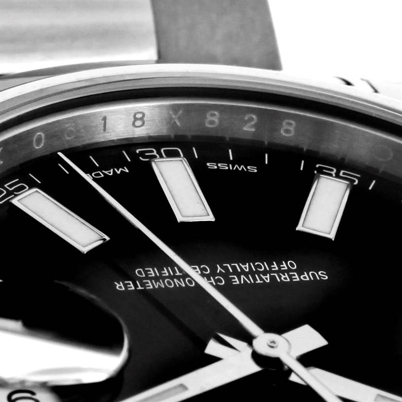 This image shows a close-up of the Rolex Datejust 41 116300 Stainless Steel Black Dial 116300 Stainless Steel Black Dial, focusing on the dial, markers, and part of the bezel at an angled view.
