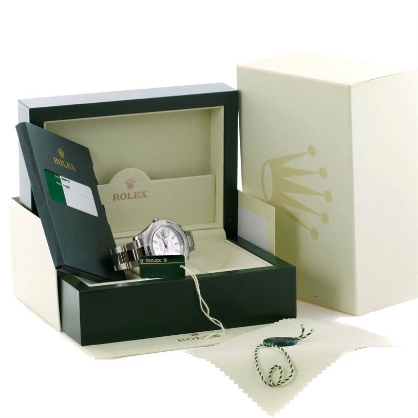 The Rolex Datejust 41 116300 Stainless Steel Silver Dial 116300 Stainless Steel Silver Dial watch is shown in its open box along with accessories including booklets, tags, and a cloth.