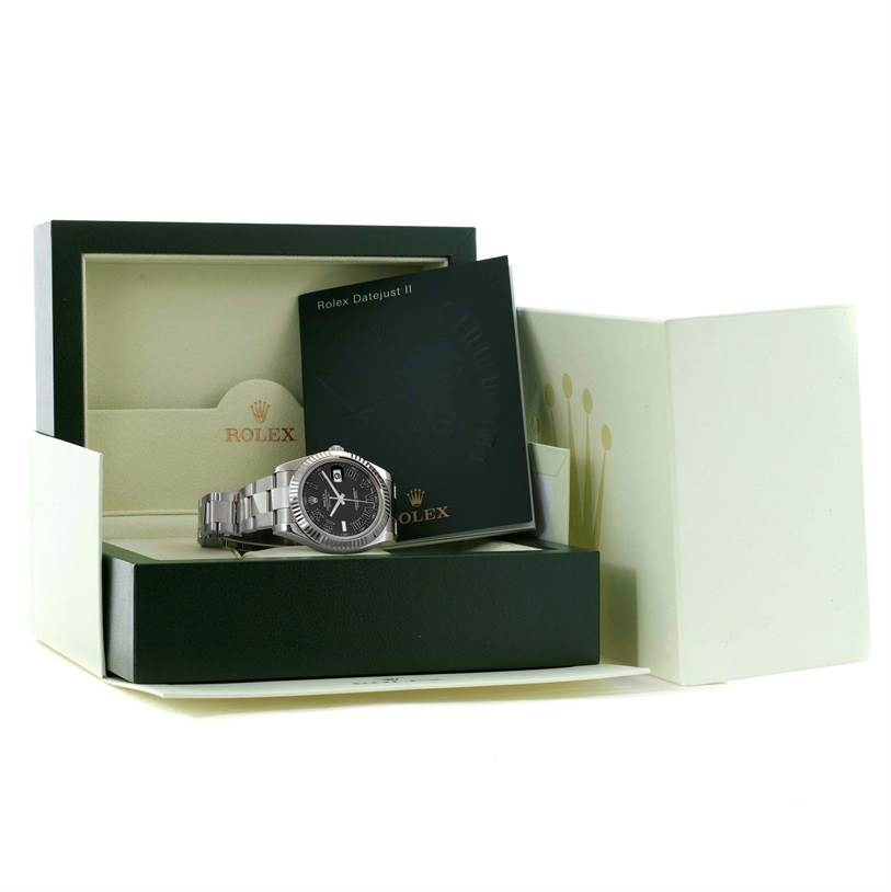 The Rolex Datejust 41 116334 Men
s Stainless Steel Grey Dial 116334 Men
s Stainless Steel Grey Dial watch is displayed front-facing in an open box with accompanying booklets.