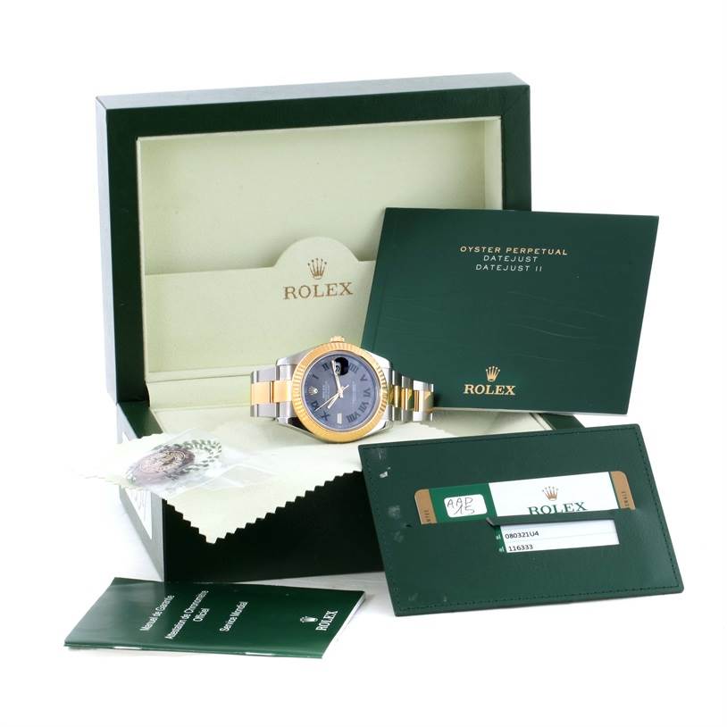 The Rolex Datejust 41 116333GYRO Men's Steel and Gold (two tone) Grey Dial 116333GYRO Men's Steel and Gold (two tone) Grey Dial model is shown with its box, warranty cards, and user manuals from a front angle.