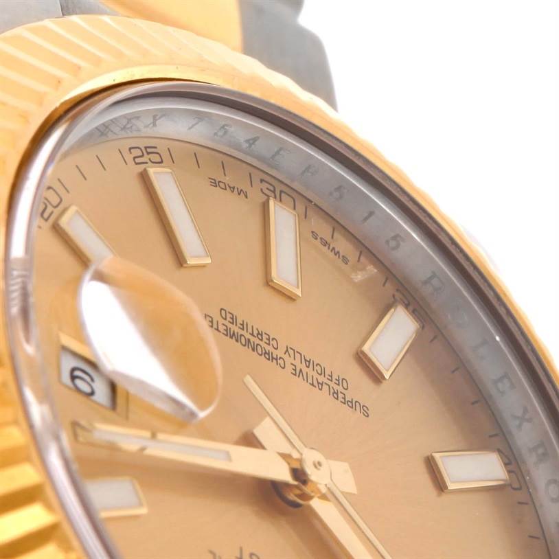The image shows a close-up of the dial, hands, and fluted bezel of the Rolex Datejust 41 116333CSO Men's Steel and Gold (two tone) Champagne Dial 116333CSO Men's Steel and Gold (two tone) Champagne Dial watch.