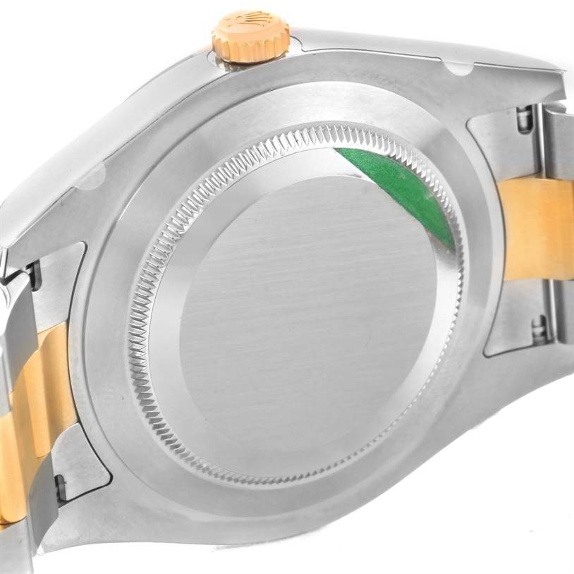 The image shows the back case of a Rolex Datejust 41 116333ISO Men's Steel and Gold (two tone) Beige Dial 116333ISO Men's Steel and Gold (two tone) Beige Dial watch, viewed from the side angle, highlighting the crown and part of the bracelet.