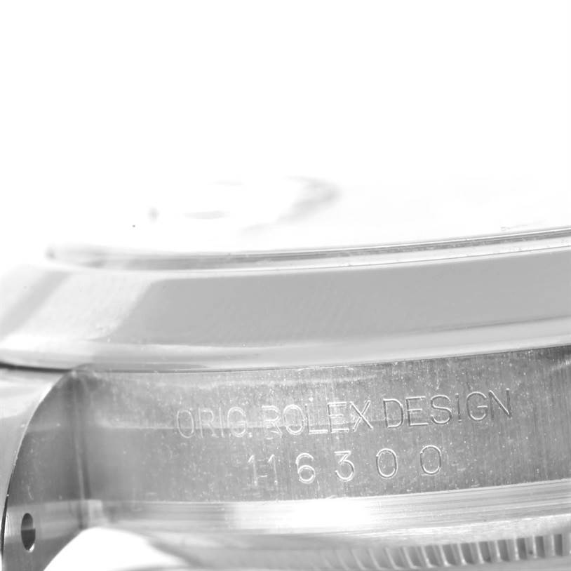 This image shows a close-up of the side of a Rolex Datejust 41 116300 Men's Stainless Steel Black Dial 116300 Men's Stainless Steel Black Dial watch case, featuring the engraving "ORIG.ROLEX DESIGN" and a model number.
