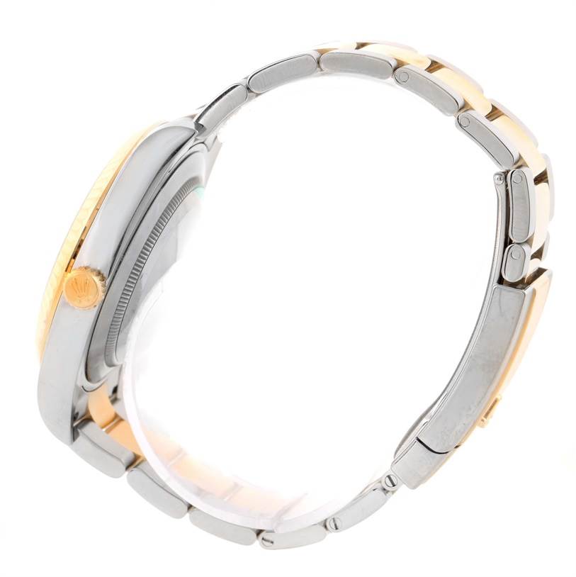 This image shows a side view of the Rolex Datejust 41 116333GYRO Men's Steel and Gold (two tone) Grey Dial 116333GYRO Men's Steel and Gold (two tone) Grey Dial, highlighting the crown and two-tone bracelet.