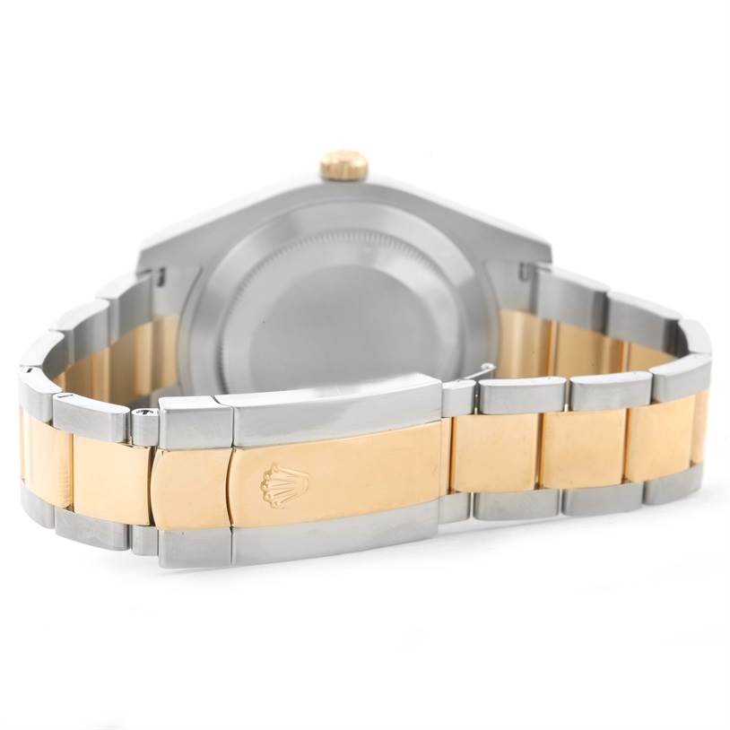 The image shows the back view and clasp of a Rolex Datejust 41 116333GYRO Men's Steel and Gold (two tone) Grey Dial 116333GYRO Men's Steel and Gold (two tone) Grey Dial watch, highlighting its two-tone metal bracelet.