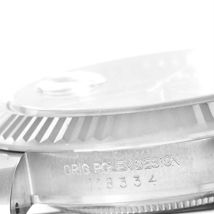 The image shows a close-up, side angle of the case with inscriptions of the Rolex Datejust 41 116334BLRO Men's Stainless Steel Blue Dial 116334BLRO Men's Stainless Steel Blue Dial bezel.