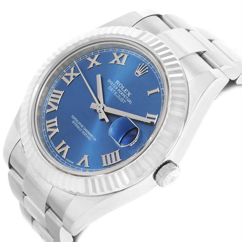 The image shows a close-up angled view of a Rolex Datejust 41 116334BLRO Men's Stainless Steel Blue Dial 116334BLRO Men's Stainless Steel Blue Dial watch, highlighting the blue dial, fluted bezel, and part of the bracelet.