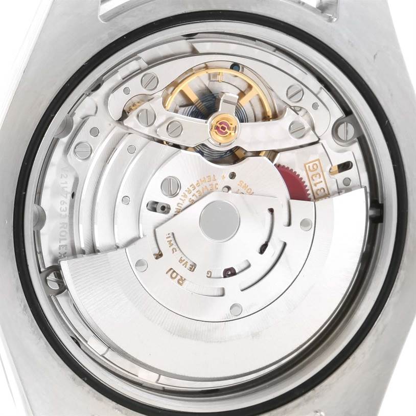 This image shows the intricate inner mechanism of a Rolex Datejust 41 116334BLRO Men's Stainless Steel Blue Dial 116334BLRO Men's Stainless Steel Blue Dial watch from a back angle.