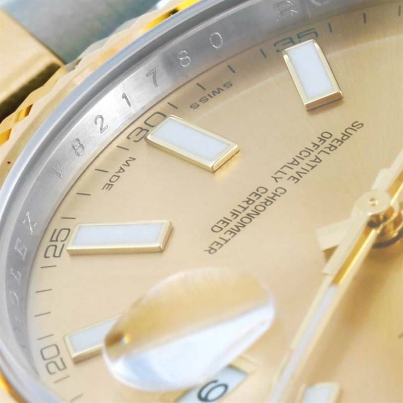 This image shows a close-up of the dial, markers, and part of the cyclops lens of the Rolex Datejust 41 116333 Men's Steel and Gold (two tone) Champagne Dial 116333 Men's Steel and Gold (two tone) Champagne Dial watch.