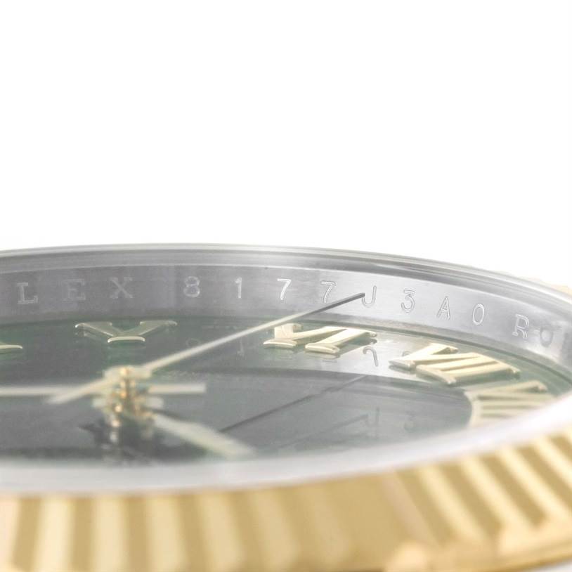 This image shows the side angle of the Rolex Datejust 41 116333 Men's Steel and Gold (two tone) Black Dial 116333 Men's Steel and Gold (two tone) Black Dial's dial, bezel, and part of the engraved rehaut.