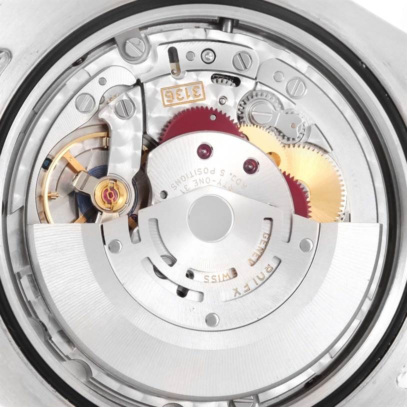 The image shows the internal mechanism and components of the Rolex Datejust 41 116334BLRO Men's Stainless Steel Blue Dial 116334BLRO Men's Stainless Steel Blue Dial watch at a close-up angle.