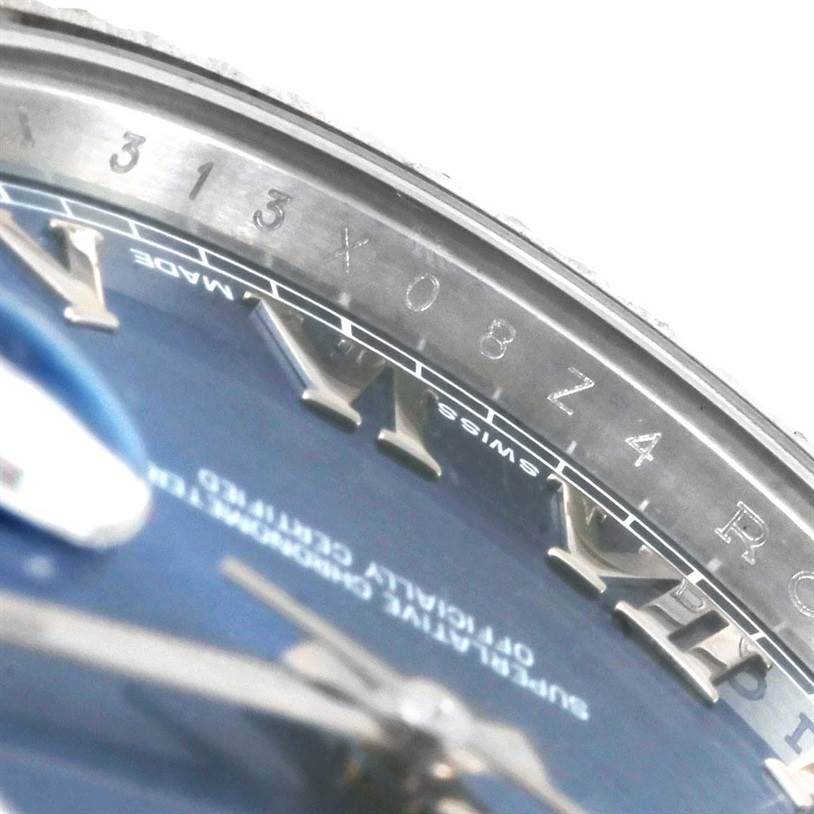 The image shows a partial close-up of the Rolex Datejust 41 116334BLRO Men's Stainless Steel Blue Dial 116334BLRO Men's Stainless Steel Blue Dial watch dial, focusing on the bezel and hour markers.