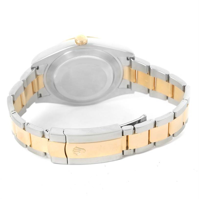 The image shows the case back and bracelet clasp of a Rolex Datejust 41 116333 Men
s Steel and Gold (two tone) Grey Dial 116333 Men
s Steel and Gold (two tone) Grey Dial watch, viewed from the back.