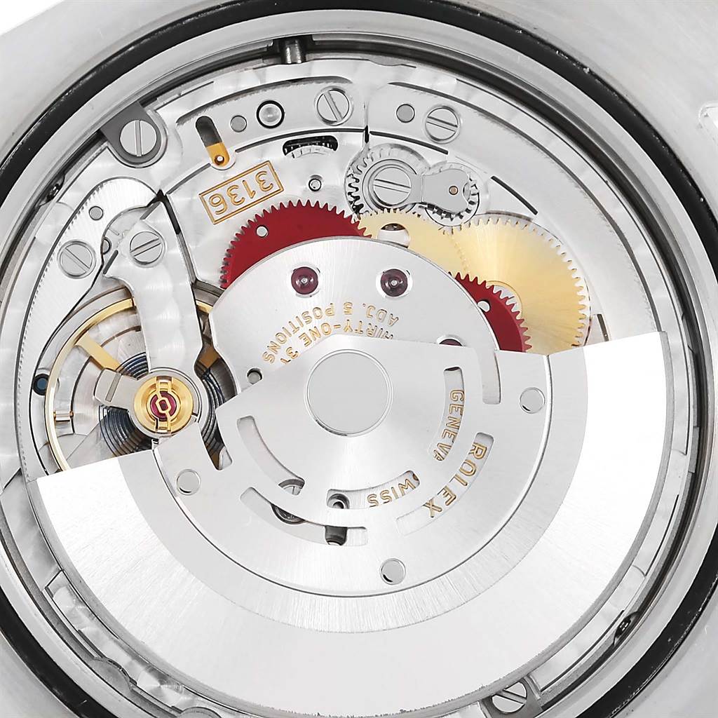This image shows the movement mechanism of a Rolex Datejust 41 116334BLRO Men's Stainless Steel Grey Dial 116334BLRO Men's Stainless Steel Grey Dial watch from a close-up angle.