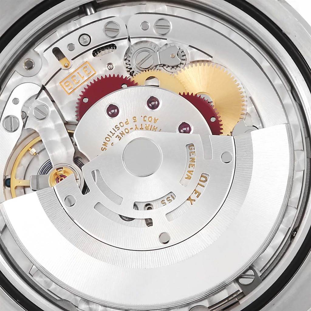 This image shows a close-up view of the internal movement mechanism of a Rolex Datejust 41 116333 Men's Steel and Gold (two tone) Black Dial 116333 Men's Steel and Gold (two tone) Black Dial watch.