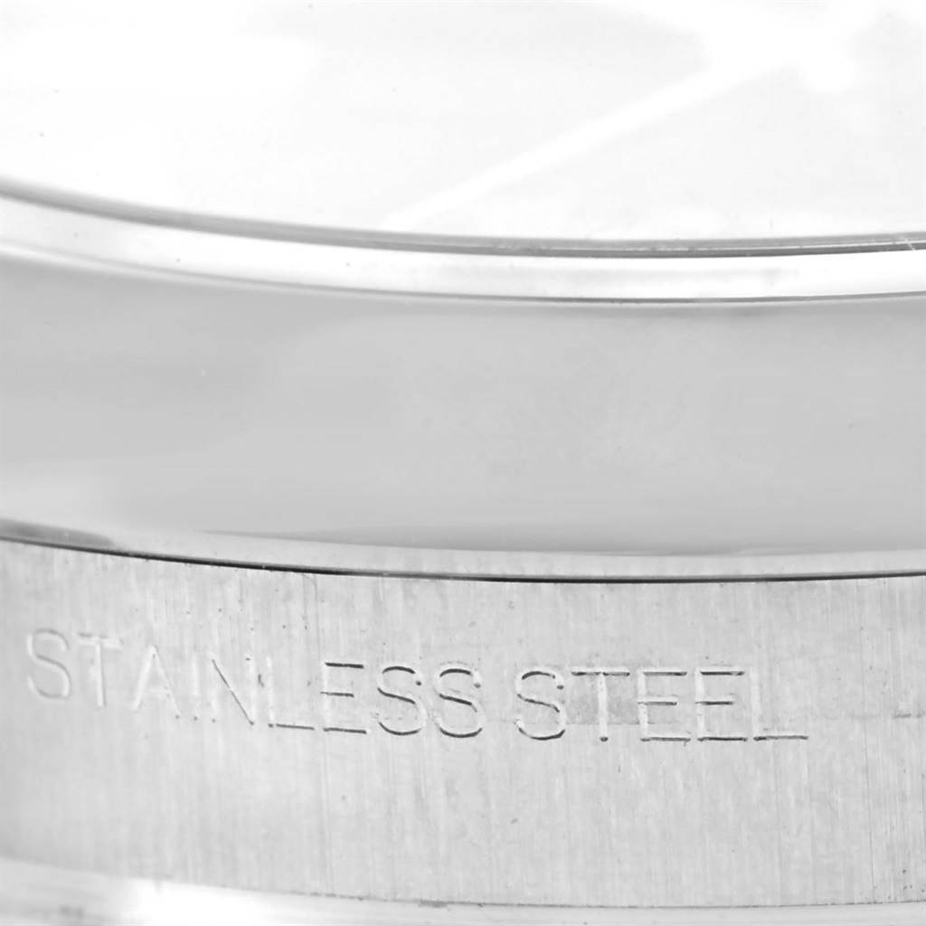 The image shows a close-up of the stainless steel side of the Rolex Datejust 41 116300 Men's Stainless Steel Grey Dial 116300 Men's Stainless Steel Grey Dial watch case.