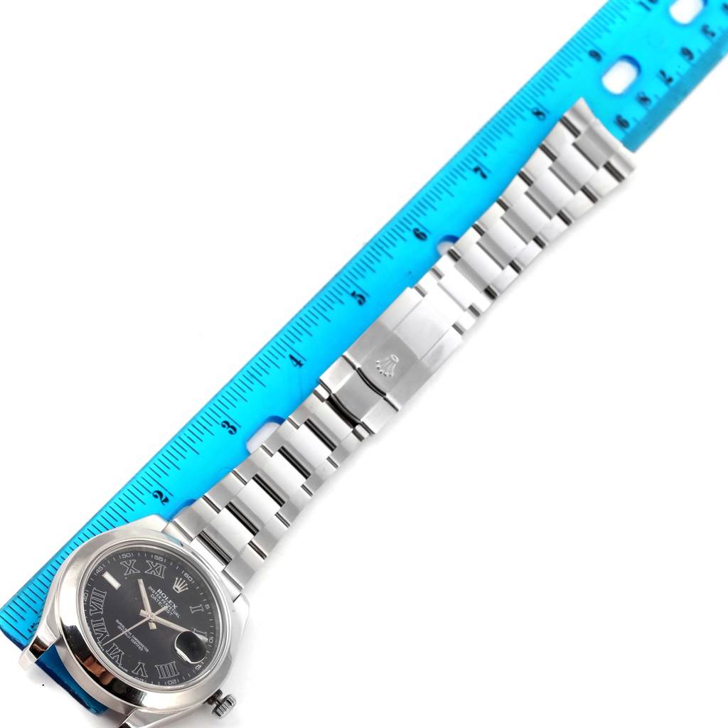 The image shows a Rolex Datejust 41 116300 Men's Stainless Steel Grey Dial 116300 Men's Stainless Steel Grey Dial watch, laid flat against a ruler, displaying the face, clasp, and bracelet.