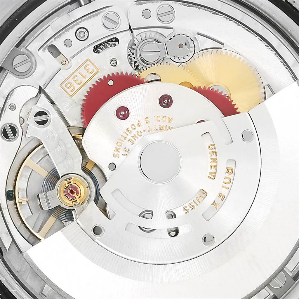 This image shows a close-up view of the internal mechanism of the Rolex Datejust 41 116300 Men's Stainless Steel Grey Dial 116300 Men's Stainless Steel Grey Dial watch, highlighting its intricate gears and components.