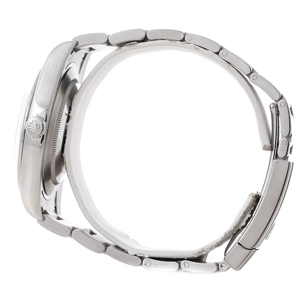 The image shows a side view of the Rolex Datejust 41 116300 Men's Stainless Steel White Dial 116300 Men's Stainless Steel White Dial watch, displaying its crown, case, and bracelet.