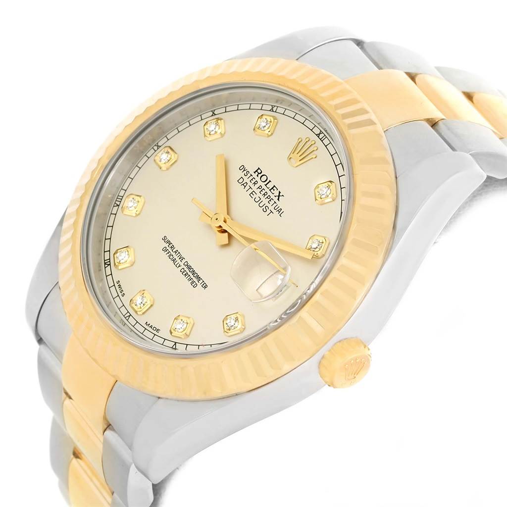 This image displays the face, bezel, and part of the strap of a Rolex Datejust 41 116333 Men's Steel and Gold (two tone) Beige Dial 116333 Men's Steel and Gold (two tone) Beige Dial watch at an angle.