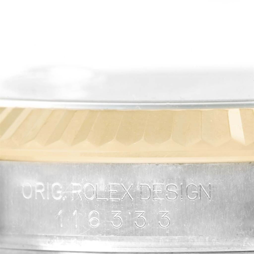 The image shows a close-up of the fluted bezel and case side of the Rolex Datejust 41 116333 Men's Steel and Gold (two tone) Beige Dial 116333 Men's Steel and Gold (two tone) Beige Dial with the engraved model number.