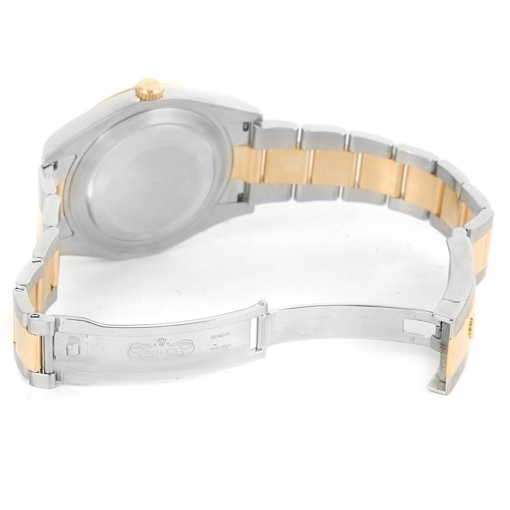 The image shows the open clasp and back of the casing of a Rolex Datejust 41 116333 Men's Steel and Gold (two tone) Beige Dial 116333 Men's Steel and Gold (two tone) Beige Dial watch, highlighting the two-tone bracelet and clasp details.