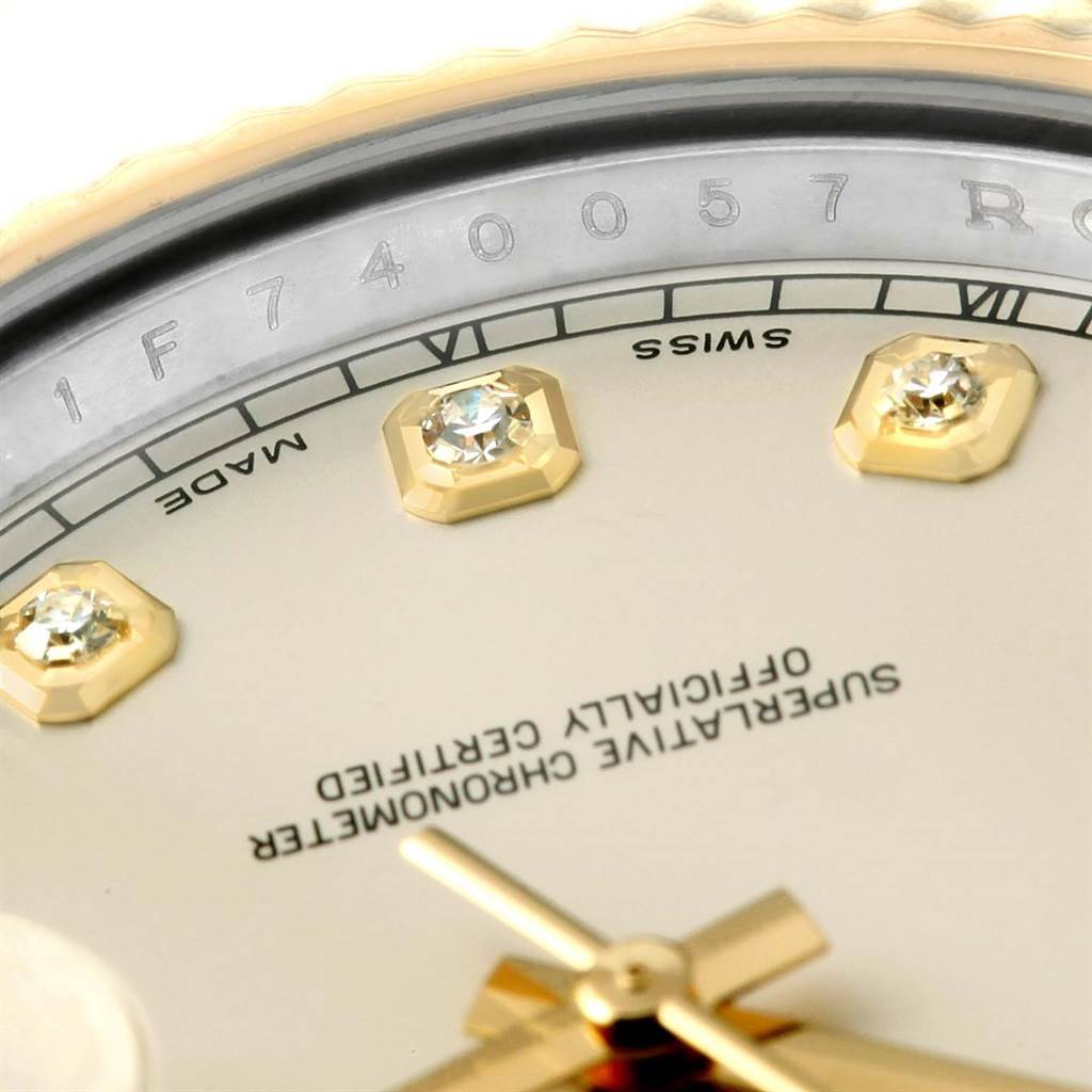 This close-up angle of the Rolex Datejust 41 116333 Men's Steel and Gold (two tone) Beige Dial 116333 Men's Steel and Gold (two tone) Beige Dial reveals the diamond hour markers, partial dial text, and hands.