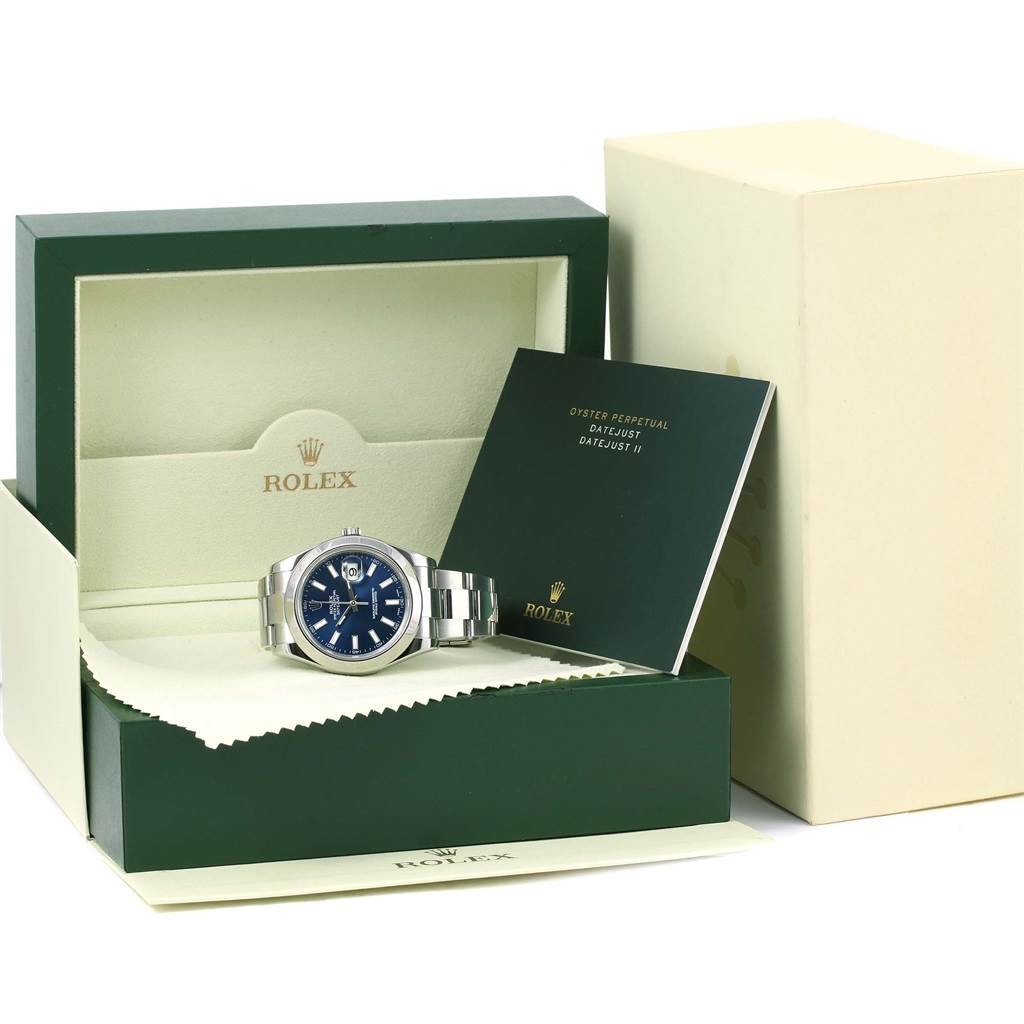 The image shows a Rolex Datejust 41 116300 Men's Stainless Steel Blue Dial 116300 Men's Stainless Steel Blue Dial watch inside its open box along with accompanying booklets.
