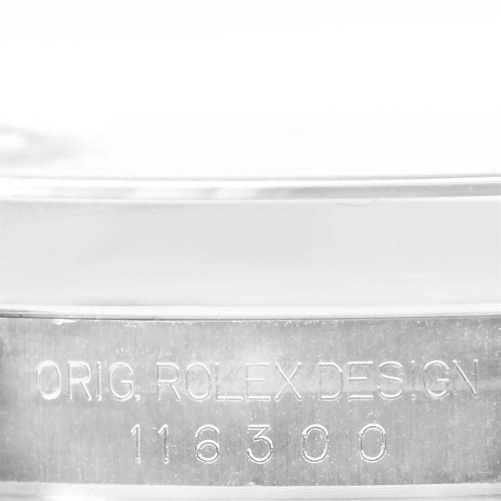 This image shows a close-up of the engraved side of the Rolex Datejust 41 116300 Men's Stainless Steel Blue Dial 116300 Men's Stainless Steel Blue Dial model, displaying its serial number.