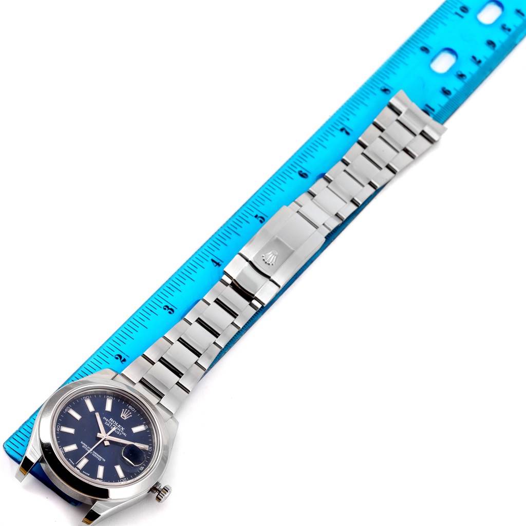 The image shows a Rolex Datejust 41 116300 Men's Stainless Steel Blue Dial 116300 Men's Stainless Steel Blue Dial watch in a top-down angle, displaying its face, case, and stainless steel bracelet.