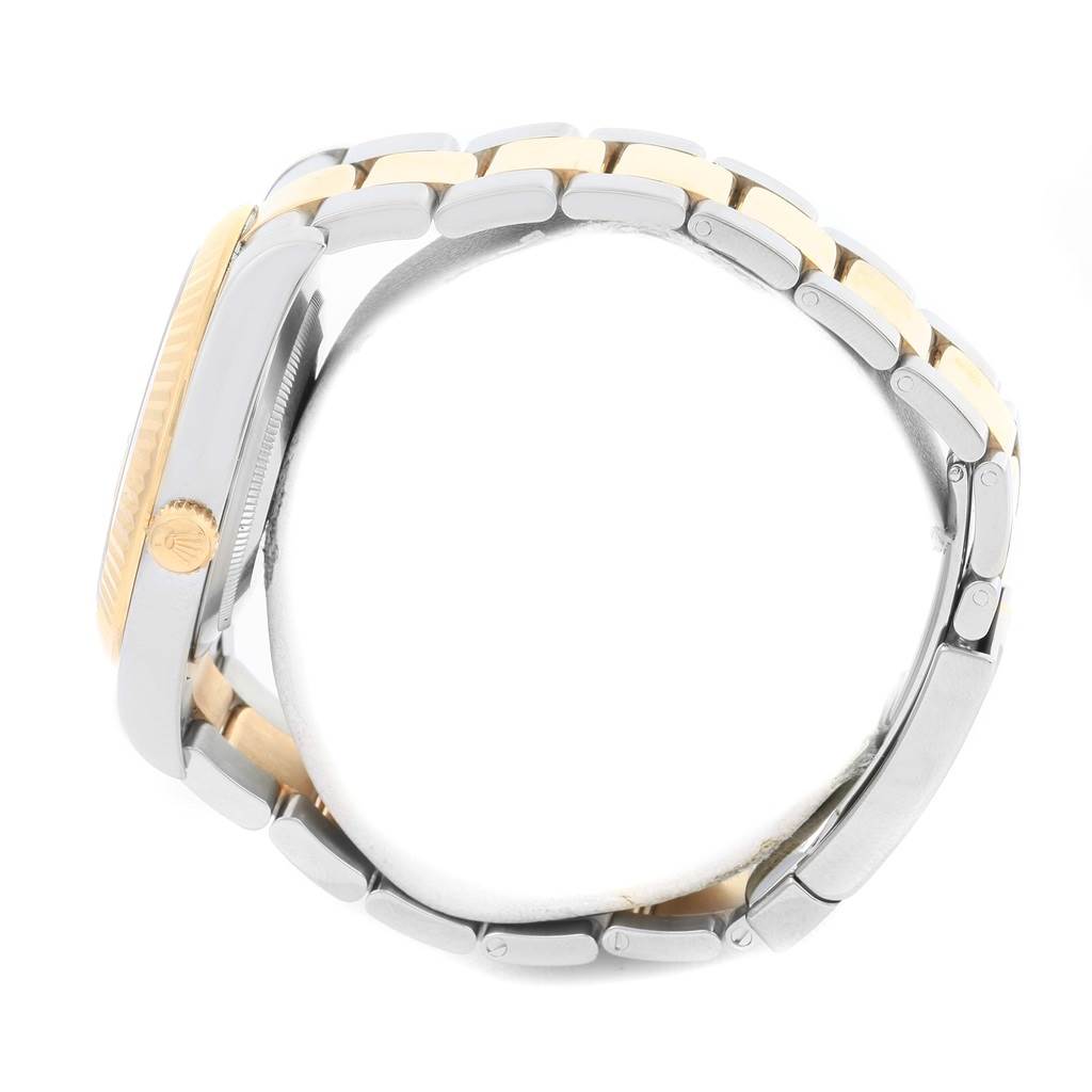 The image shows a side view of a Rolex Datejust 41 116333 Men
s Steel and Gold (two tone) Beige Dial 116333 Men
s Steel and Gold (two tone) Beige Dial, highlighting its case, crown, and two-tone bracelet.