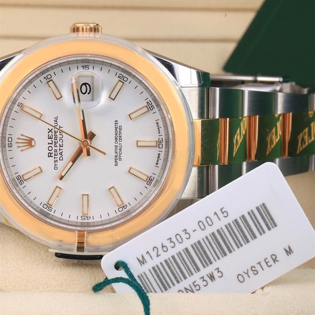 The image shows the face, bezel, part of the bracelet, and a tag of the Rolex Datejust 41 126303 Men's Steel and Gold (two tone) White Dial 126303 Men's Steel and Gold (two tone) White Dial model.