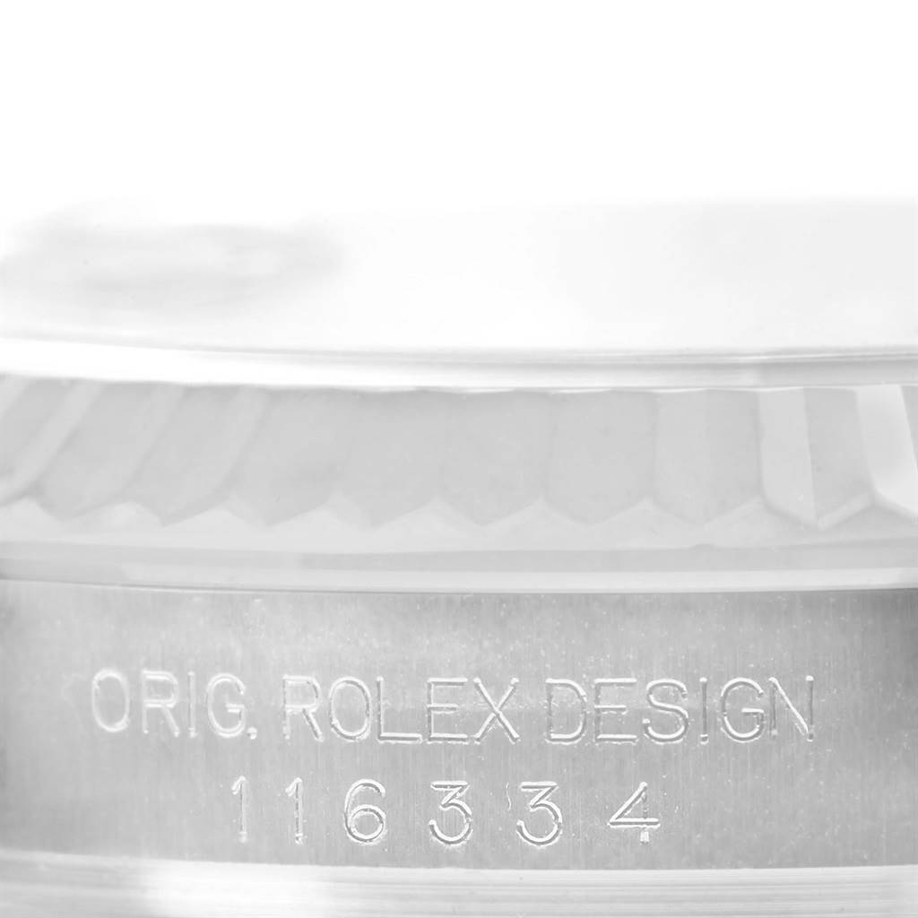 This image shows a close-up of the side engraving on the bezel of a Rolex Datejust 41 116334 Men's Stainless Steel Black Dial 116334 Men's Stainless Steel Black Dial watch.