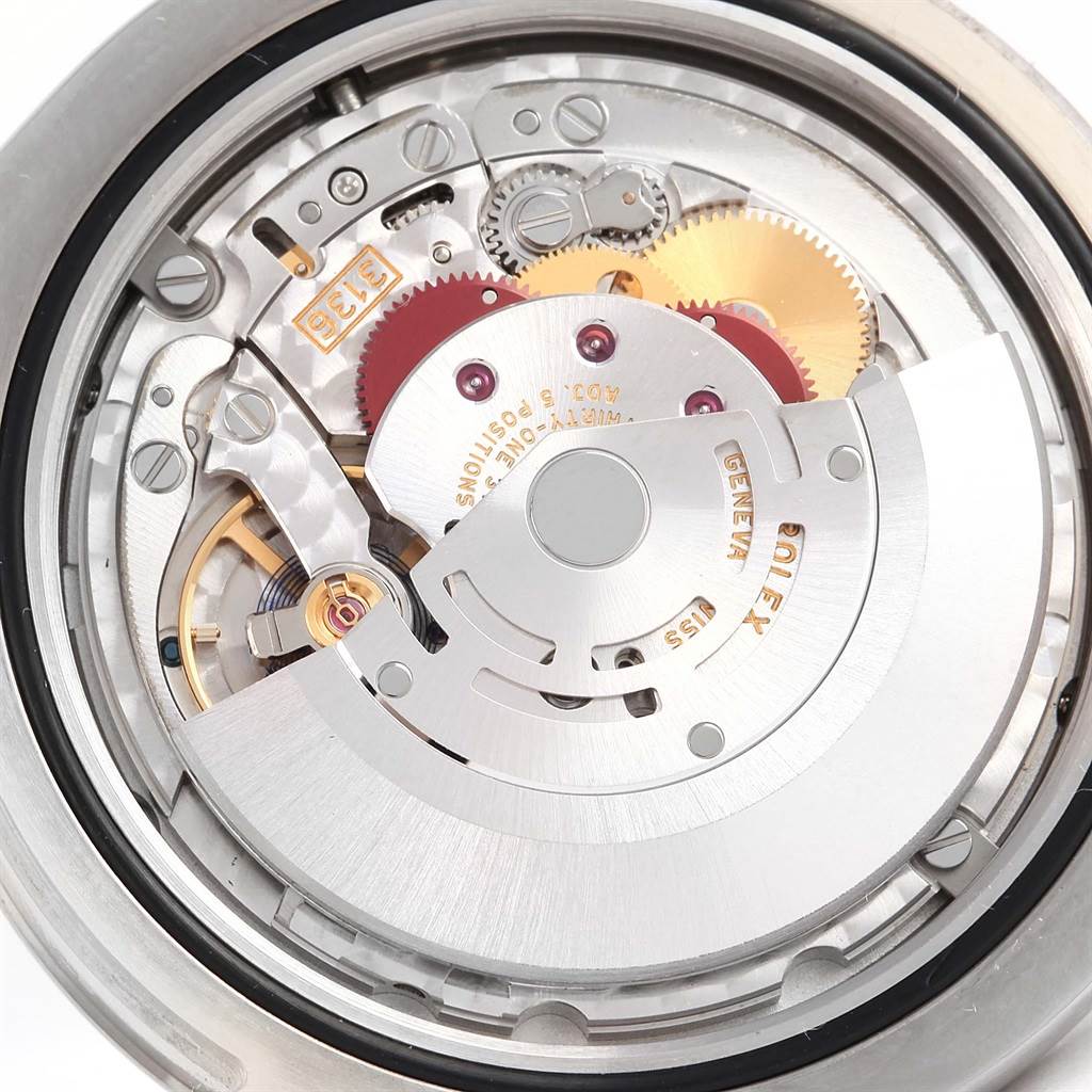 This is a close-up view of the movement of a Rolex Datejust 41 116334 Men's Stainless Steel Black Dial 116334 Men's Stainless Steel Black Dial model, showing its intricate gears and components.