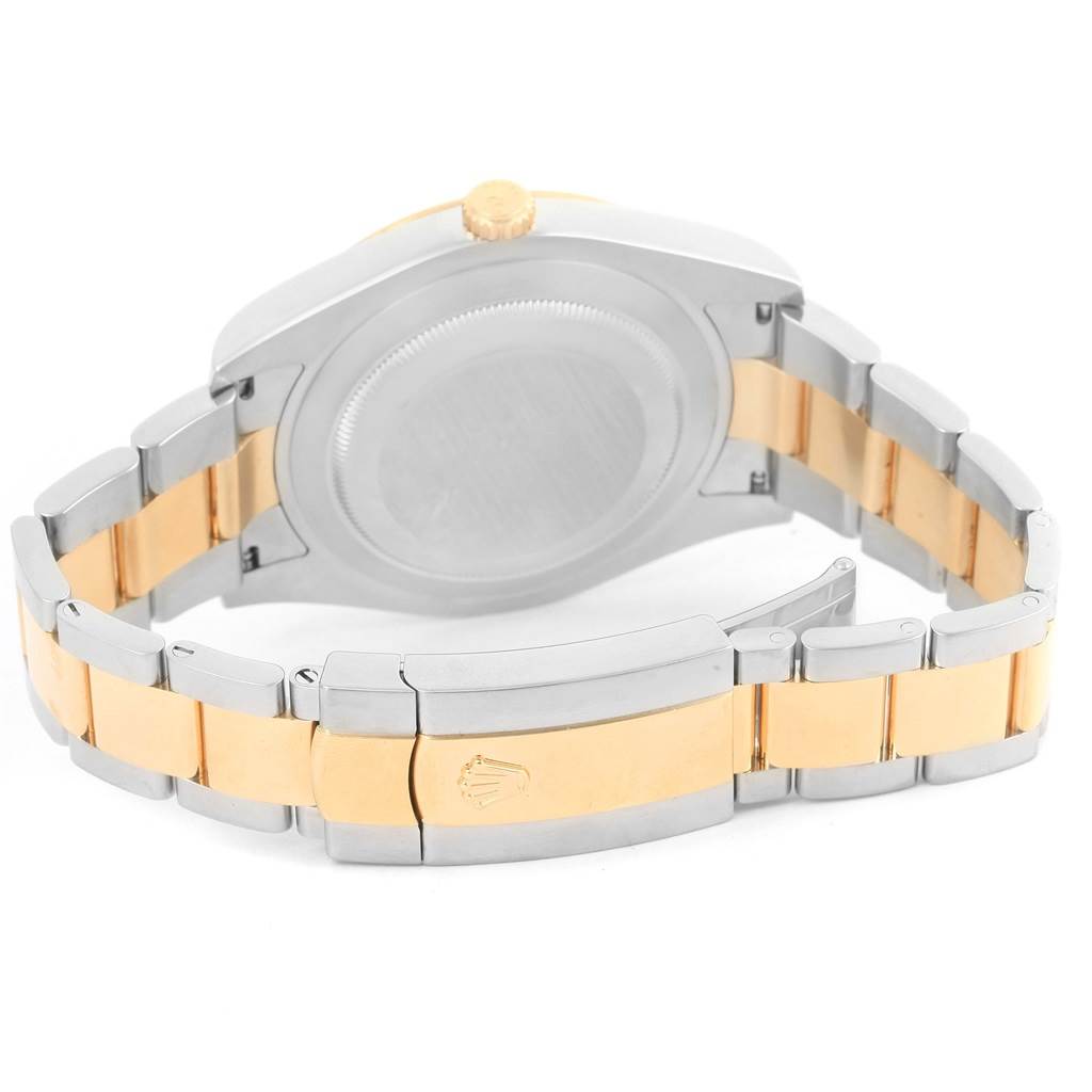 The image shows the back case and the two-tone bracelet of a Rolex Datejust 41 116333 Men's Steel and Gold (two tone) Champagne Dial 116333 Men's Steel and Gold (two tone) Champagne Dial watch from a rear angle.