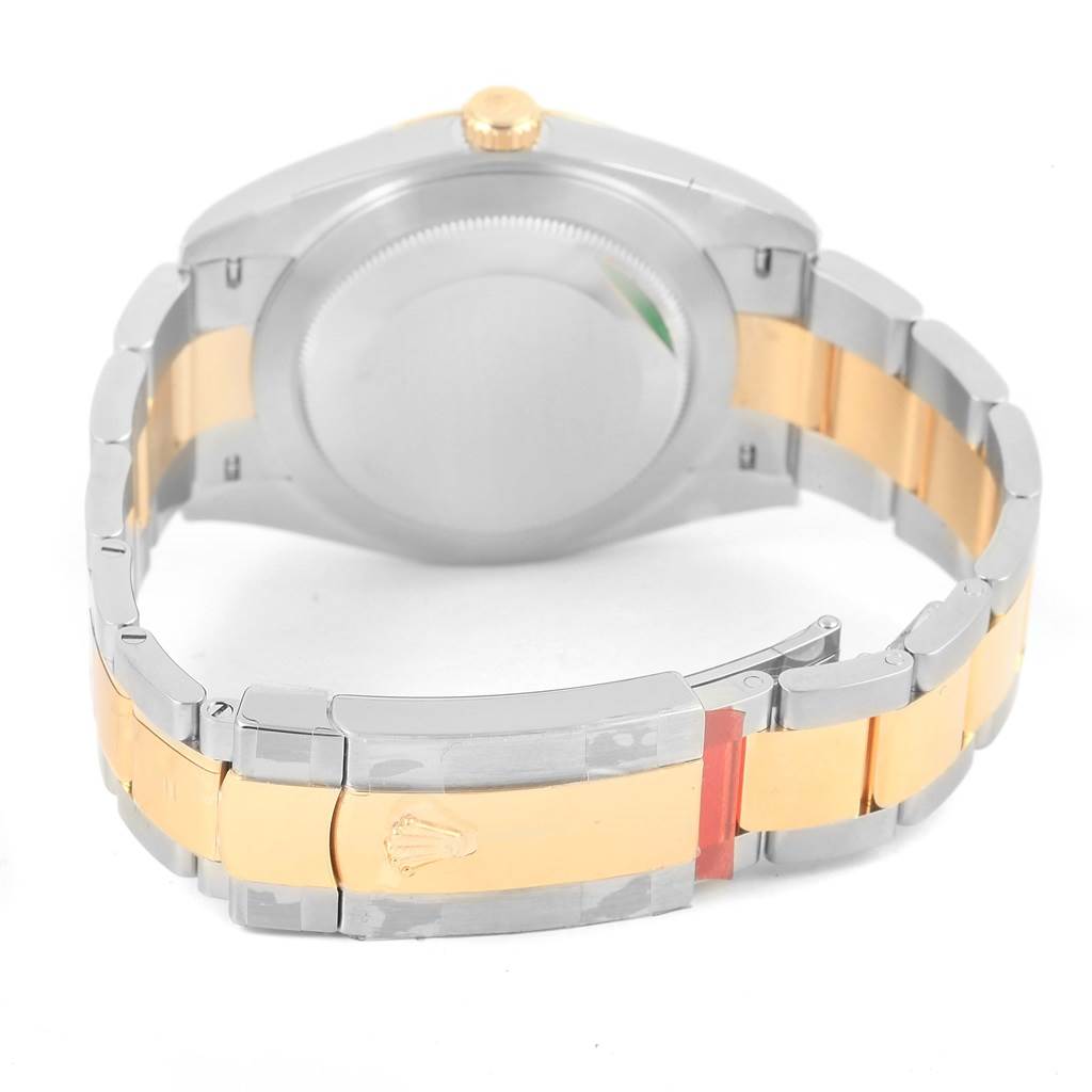 The image shows the back view and clasp of a Rolex Datejust 41 126333 Men's Steel and Gold (two tone) Silver Dial 126333 Men's Steel and Gold (two tone) Silver Dial watch, highlighting the two-tone band and case back.