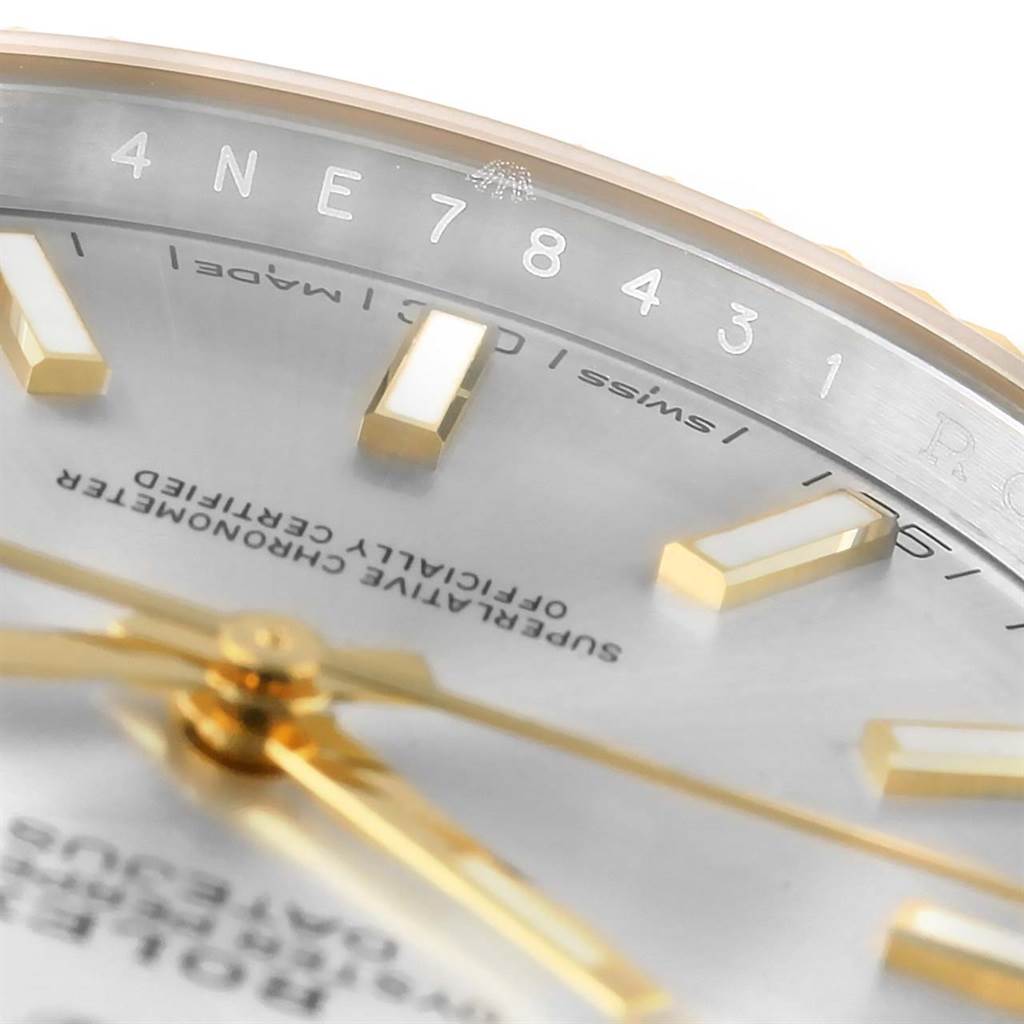This close-up angle of the Rolex Datejust 41 126333 Men's Steel and Gold (two tone) Silver Dial 126333 Men's Steel and Gold (two tone) Silver Dial shows the dial, hour markers, hands, and part of the serial number.