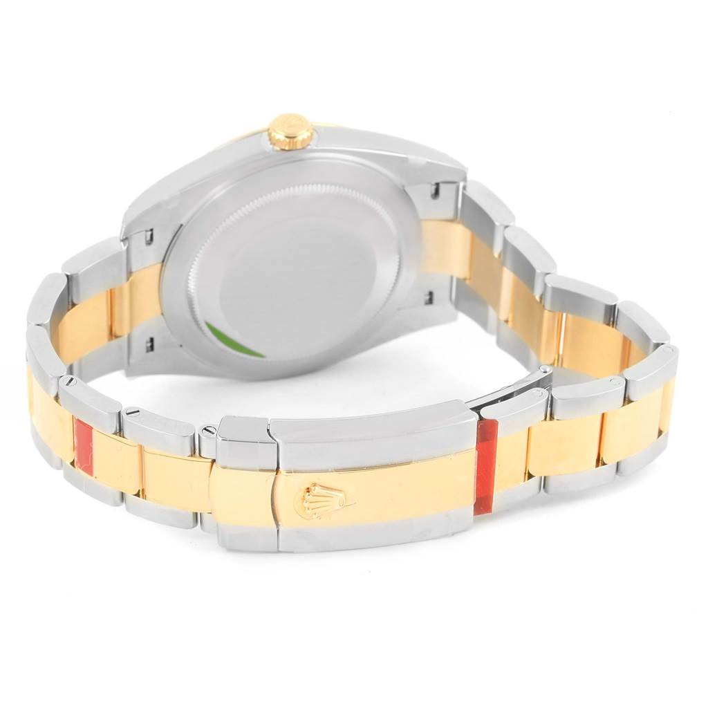 This image shows the back casing and bracelet of a Rolex Datejust 41 126333 Men's Steel and Gold (two tone) White Dial 126333 Men's Steel and Gold (two tone) White Dial, highlighting its two-tone gold and silver design.