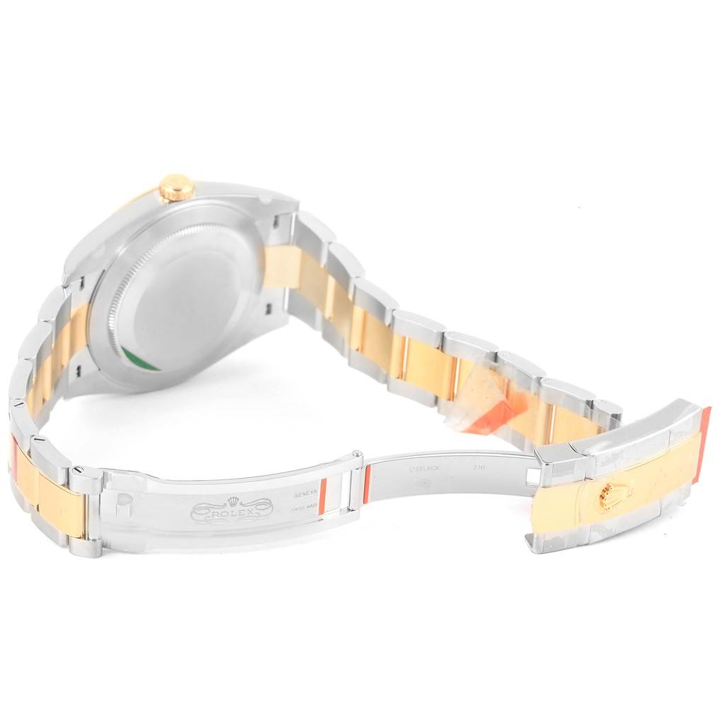 This angle of the Rolex Datejust 41 126333 Men's Steel and Gold (two tone) White Dial 126333 Men's Steel and Gold (two tone) White Dial watch shows the back of the case and the partially open clasp.