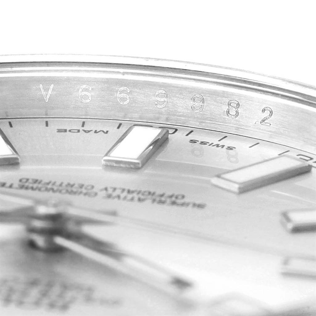 The image shows a close-up of the dial and bezel, including the serial number engraving on the Rolex Datejust 41 116334 Men's Stainless Steel Silver Dial 116334 Men's Stainless Steel Silver Dial model.