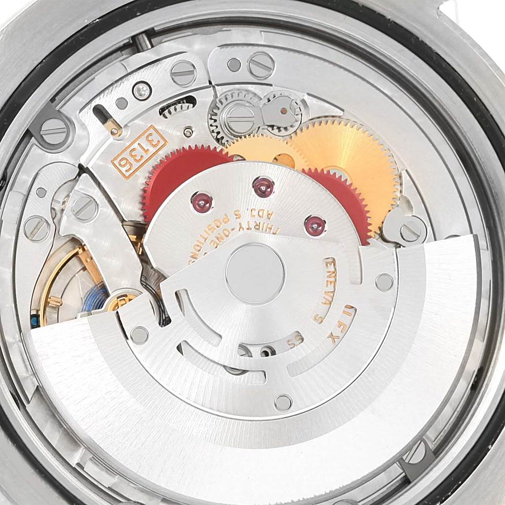This image shows the internal movement mechanism of the Rolex Datejust 41 116334 Men's Stainless Steel Black Dial 116334 Men's Stainless Steel Black Dial, highlighting gears and the rotor.